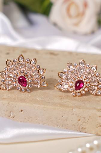 Gold plated ruby pink stone kundan stud earrings