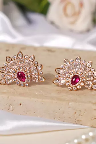 Gold plated ruby pink stone kundan stud earrings