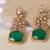 Gold plated green kundan stone long earrings