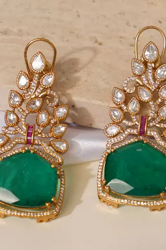 Gold plated green kundan stone long earrings