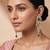 Gold plated green stones kundan long earrings
