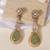 Gold plated mint green kundan stone long earrings