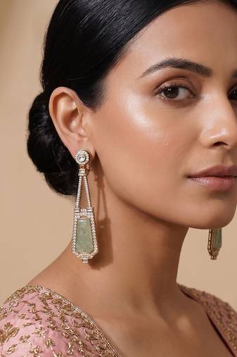 Gold plated mint green kundan stone dangler earrings
