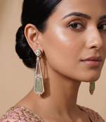 Gold plated mint green kundan stone dangler earrings