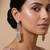 Gold plated mint green kundan stone dangler earrings