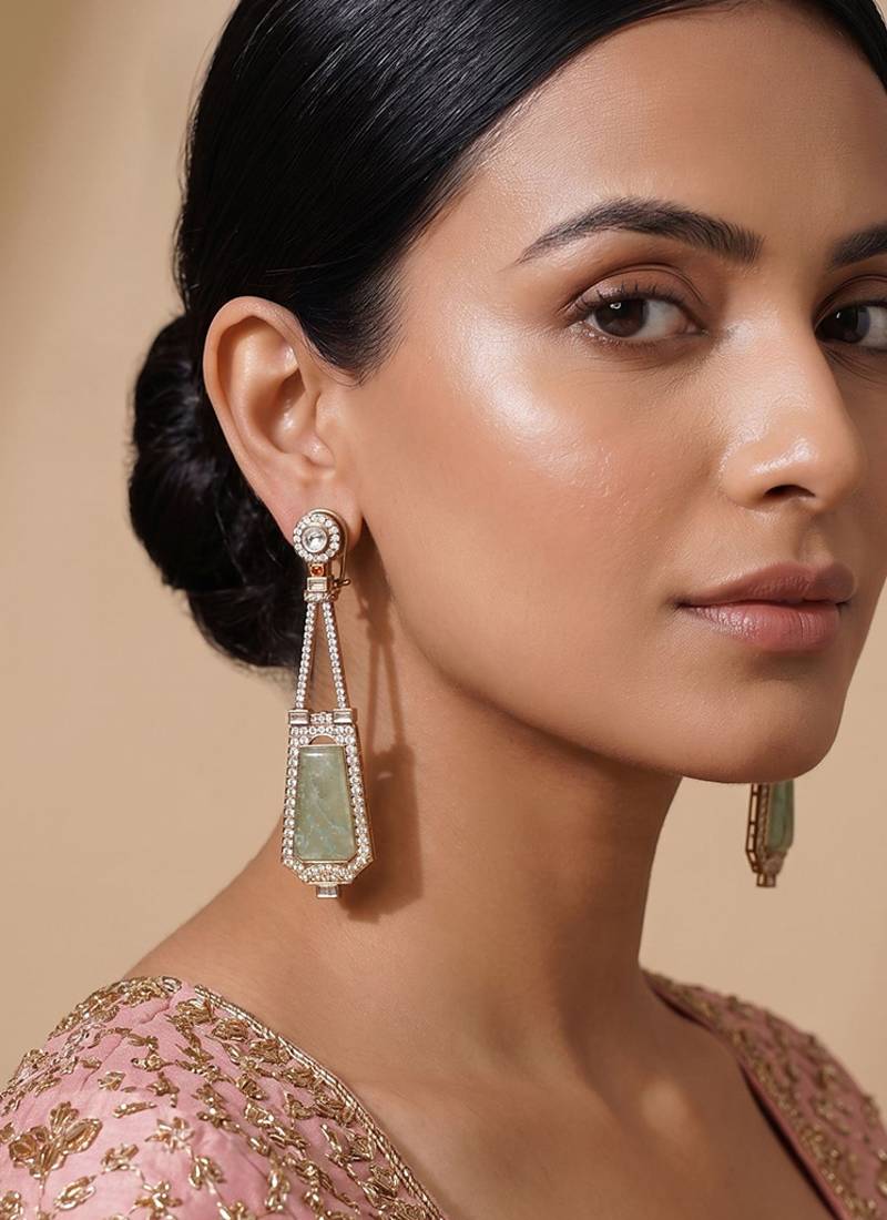 Gold plated mint green kundan stone dangler earrings