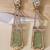 Gold plated mint green kundan stone dangler earrings