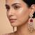 Gold plated red stone kundan long earrings