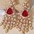 Gold plated red stone kundan long earrings