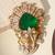 Gold plated green stone royal brooch
