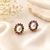 Certified natural freshwater pearls jewellery pearl stud earrings with ruby and emerald stones, gold tone oval pearl.