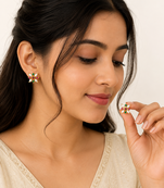 Certified natural freshwater pearls jewellery floral stud earrings with pearl, ruby & emerald stones gold-toned setting.