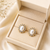 Certified natural freshwater pearls jewellery .oval pearl stud earrings with crystal halo, gold tone cz crystal surround