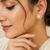 Certified natural freshwater pearls jewellery pearl centre flower stud earrings with cz stones, gold tone floral design.