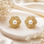 Certified natural freshwater pearls jewellery pearl centre flower stud earrings with cz stones, gold tone floral design.