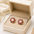 Certified natural freshwater pearls jewellery pearl centre ruby zirconia flower stud earrings, gold tone floral design.