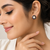 Certified natural freshwater pearls jewellery pearl & blue sapphire floral stud earrings, gold-toned flower design