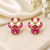 Certified natural freshwater pearls jewellery ruby & pearl stud earrings for women, gold-toned floral oval ruby stones.