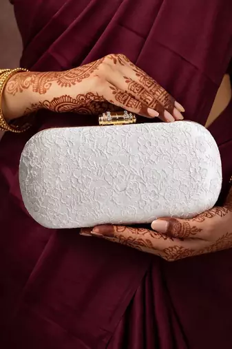 White floral thread embroidery clutch