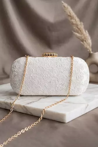 White floral thread embroidery clutch