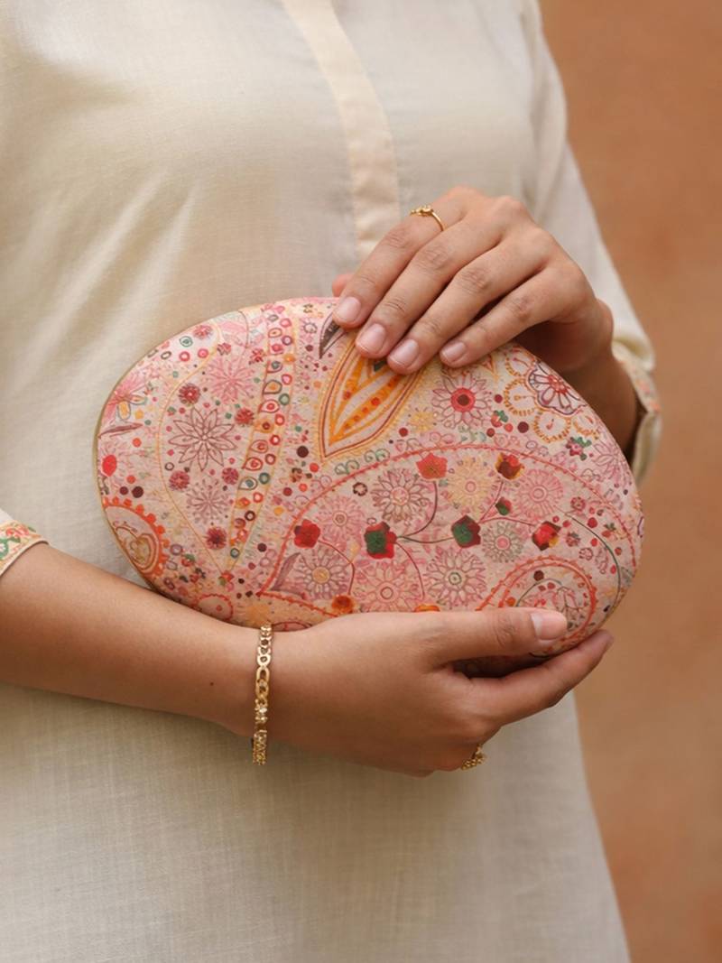 Pink printed oval clutch bag for women