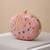 Pink printed oval clutch bag for women