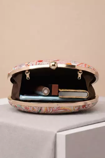 Pink printed oval clutch bag for women