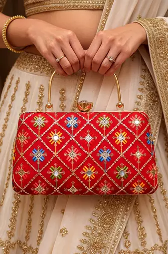 Red based sequins and threadwork embroidery clutch