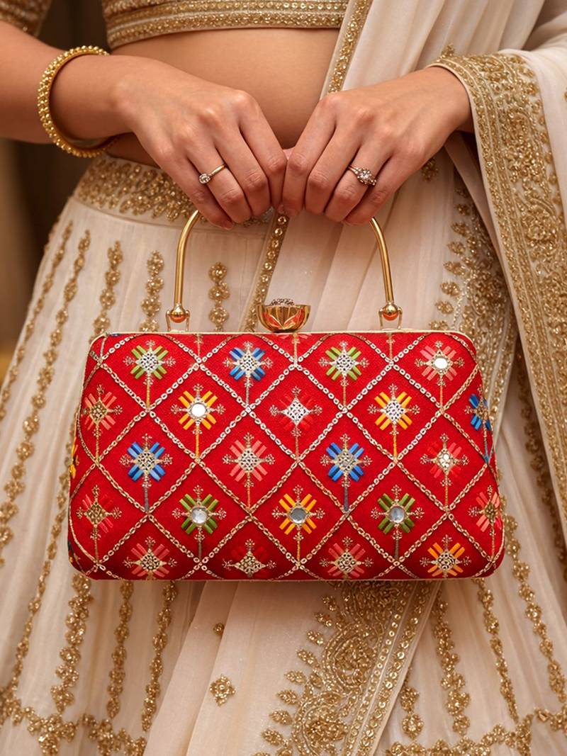 Red based sequins and threadwork embroidery clutch