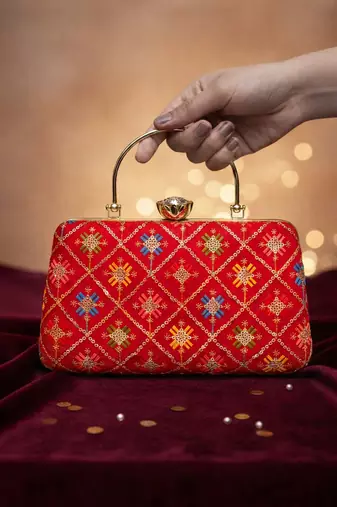 Red based sequins and threadwork embroidery clutch