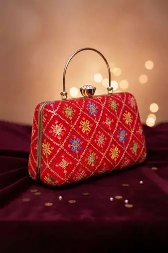 Red based sequins and threadwork embroidery clutch