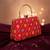 Red based sequins and threadwork embroidery clutch