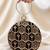 Black multipattern thread embroidery round clutch