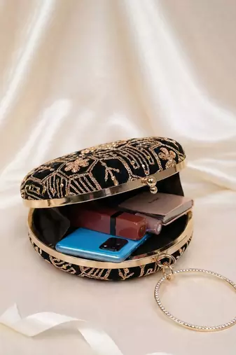 Black multipattern thread embroidery round clutch
