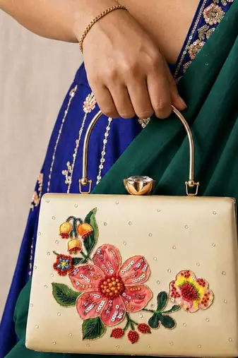 Printed ivory blossom clutch with hand embroidery