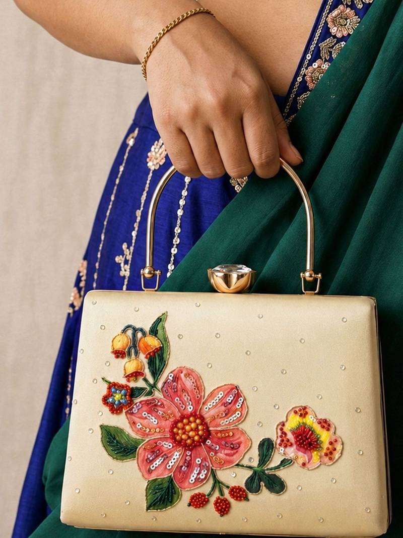 Printed ivory blossom clutch with hand embroidery