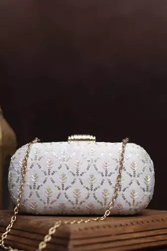 White thread and sequins embroidery clutch
