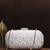 White thread and sequins embroidery clutch