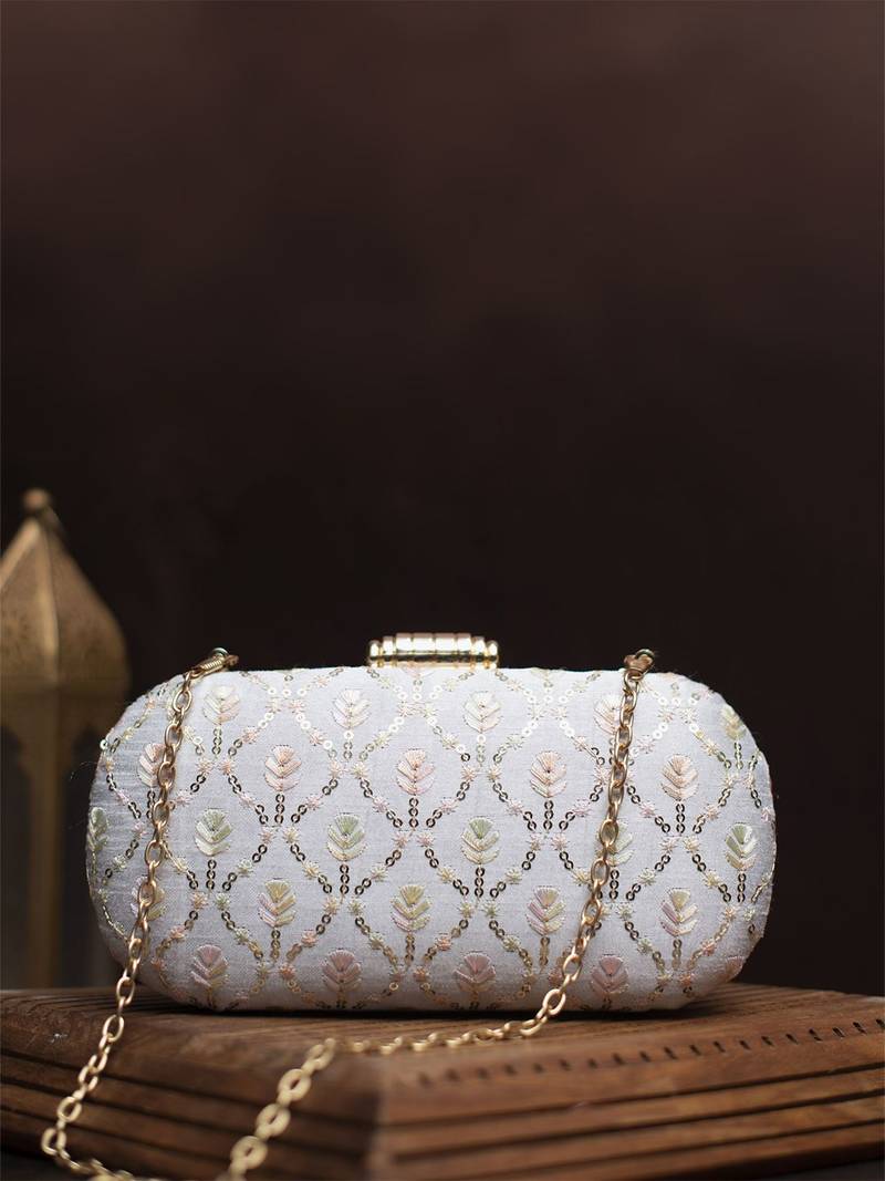 White thread and sequins embroidery clutch