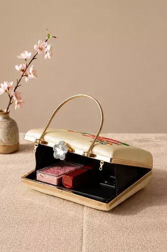 Printed ivory blossom clutch with hand embroidery