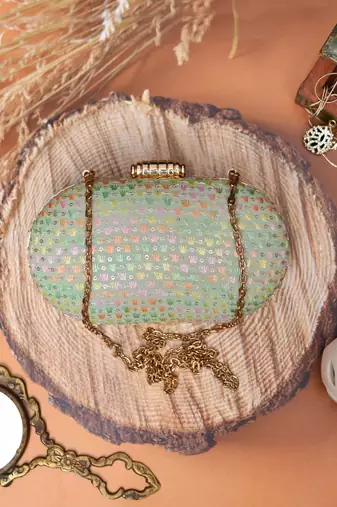 Green elegant capsule frame embroidery clutch