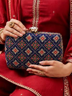Royal blue ethnic floral pattern chain strap printed clutch 1