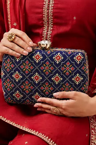 Royal blue ethnic floral pattern chain strap printed clutch