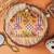  yellow  purple embroidered half moon clutch