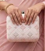  white based threadwork pattern embroidery clutch