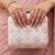  white based threadwork pattern embroidery clutch