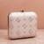  white based threadwork pattern embroidery clutch