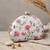  white based pink and grey threadwork embroidery clutch