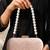  soft peach chevron pattern festive embroidery clutch