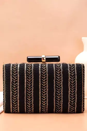  black based threadwork embroidery clutch